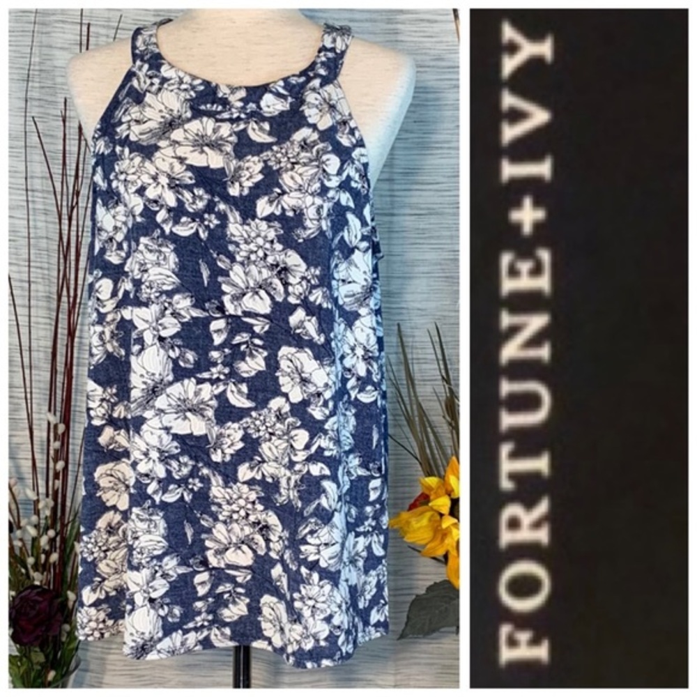 Fortune + Ivy blue and white floral sleeveless blouse.
